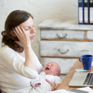 Frustrated mom trying to start a baby routine