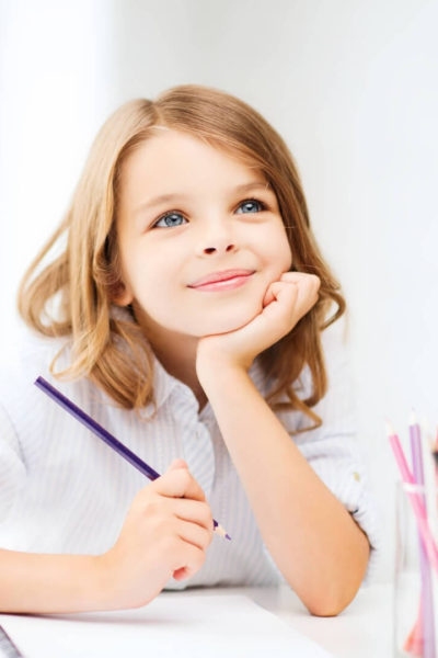 Female elementary student looking ahead