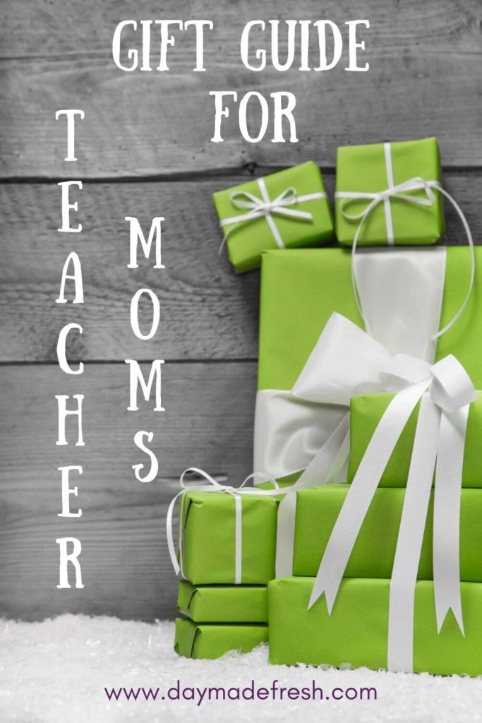 Image Text: Gift Guide for Teacher Moms Image: Green presents with white bows on snow against a gray wood wall